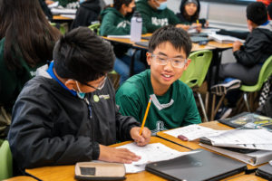 Middle school students studying