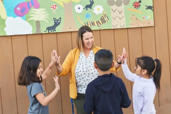 KIPP Northern California Public Schools teacher motivating students to learn.